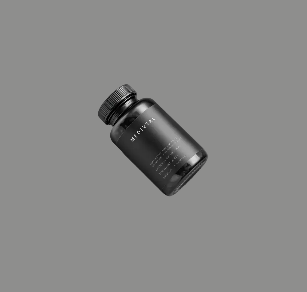 A black bottle of health supplements and vitamins with the title MEDIVTAL on a grey background